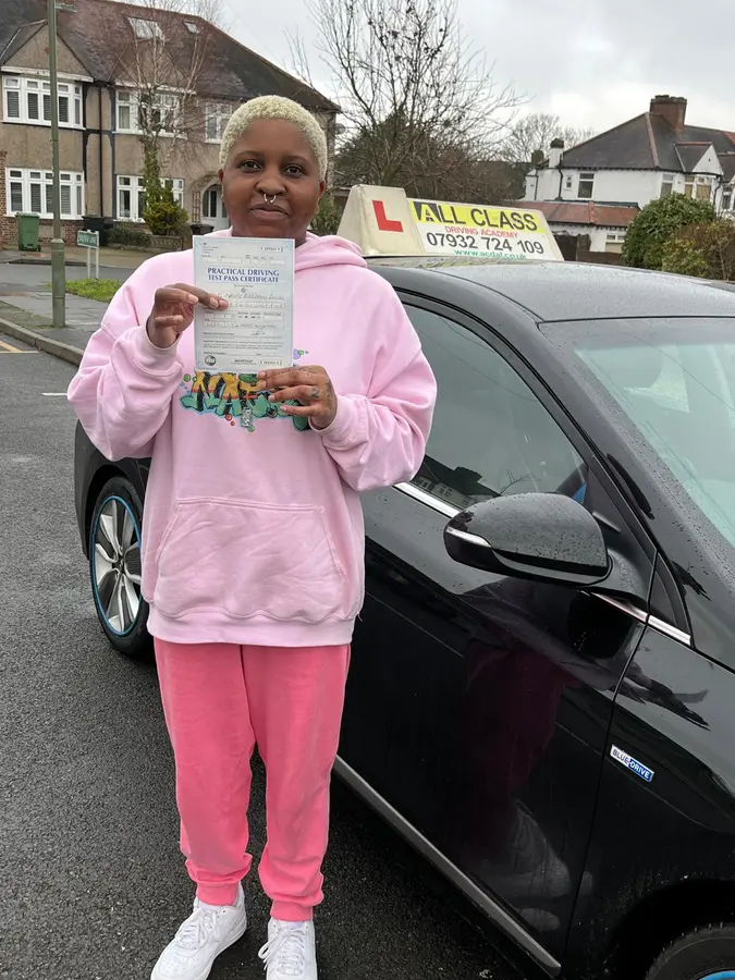 ACDAL learner celebrating a practical driving test pass 38